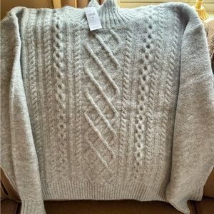 NWT light gray sweater. Never worn.